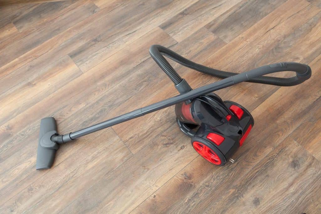 A vacuum on a freshly sanded floor