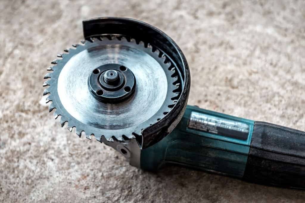 angle grinder with diamond concrete grinding disc