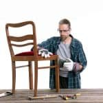 sanding a chair with mouse sander