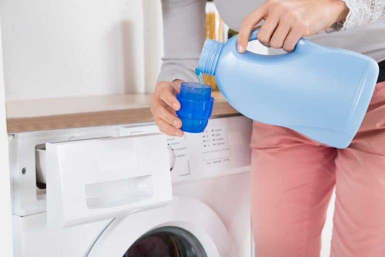 woman holding fabuloso all-purpose cleaner