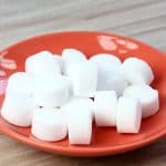 water softener salt pellets on a plate