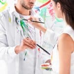 couple painting on their clothes