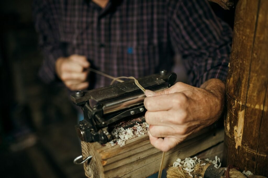 a man working on a piece of wood Which Sander Should You Buy?